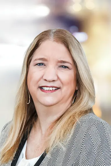 Portrait of Christine Basham, REALTOR® | Certified Full-Service Professional | ABR® | MRP | NRLUX.